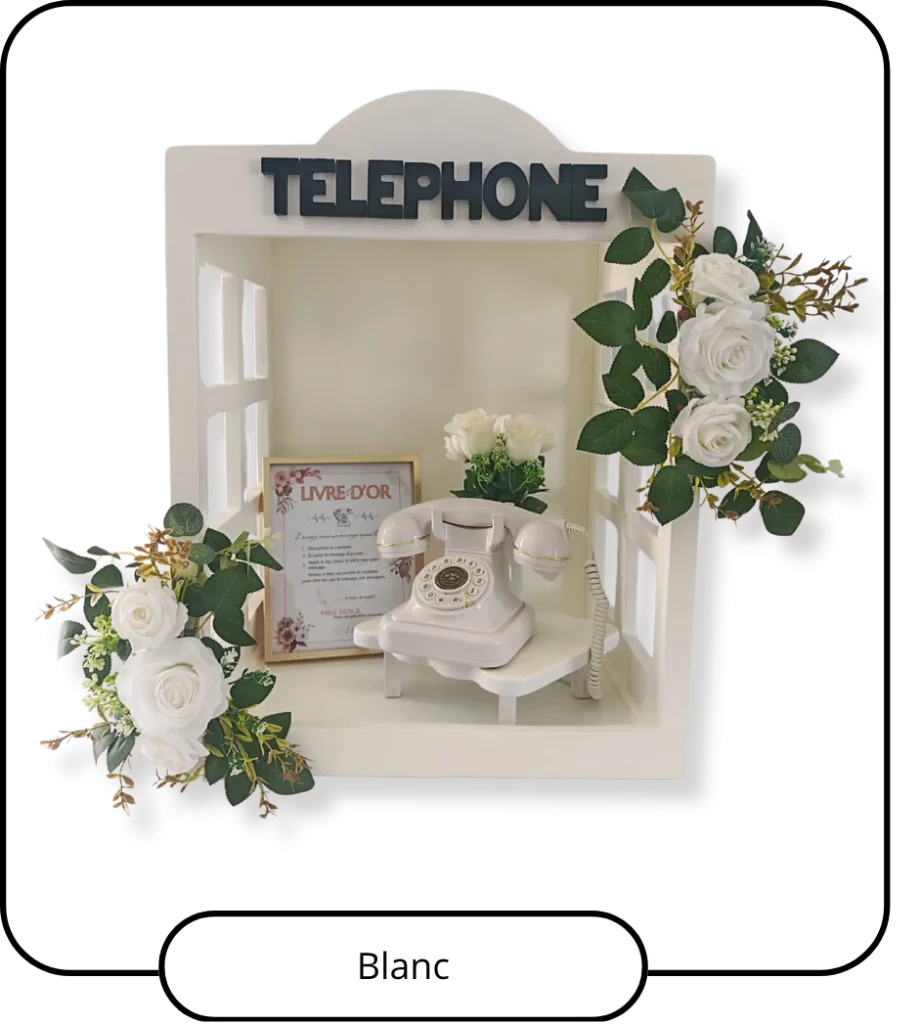 Cabine téléphonique de table décorée de fleurs blanches